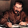 А К